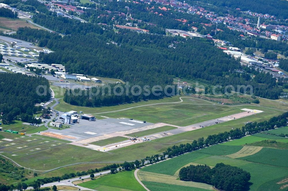Grafenwöhr from the bird's eye view: Runway with hangar taxiways and terminals on the grounds of the airport in the district Dorfgmuend in Grafenwoehr in the state Bavaria, Germany