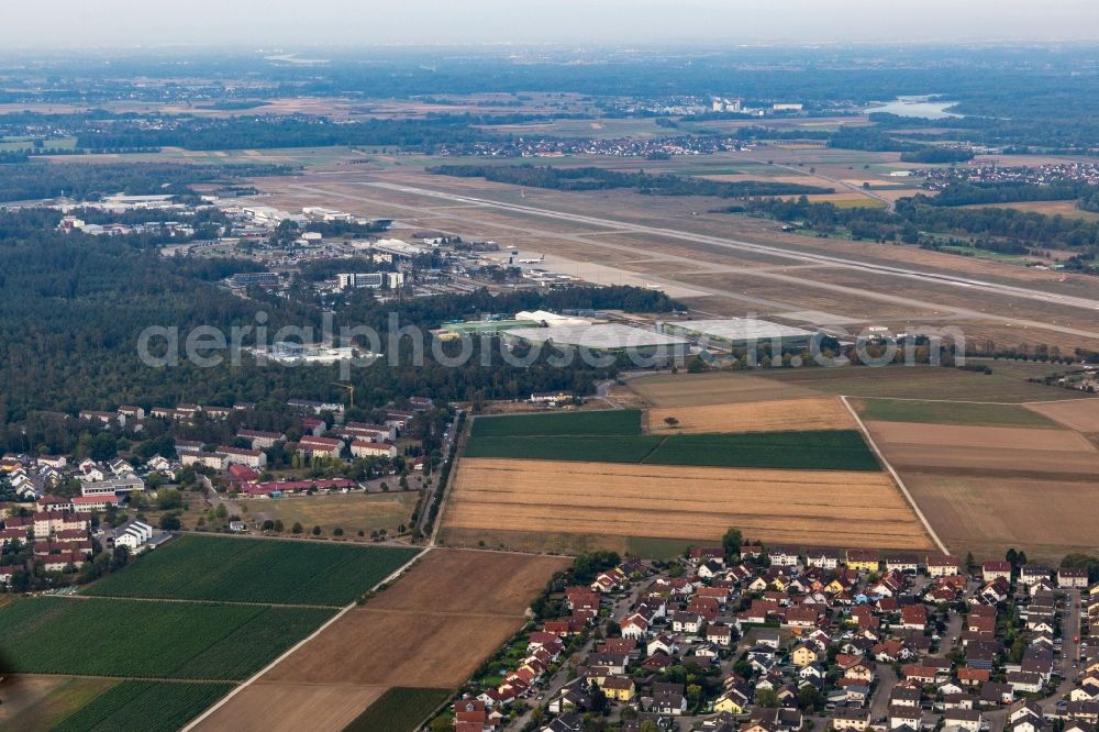 Rheinmünster from the bird's eye view: Runway with hangar taxiways and terminals on the grounds of the airport Karlsruhe / Baden-Baden (FKB) in Rheinmuenster in the state Baden-Wuerttemberg, Germany