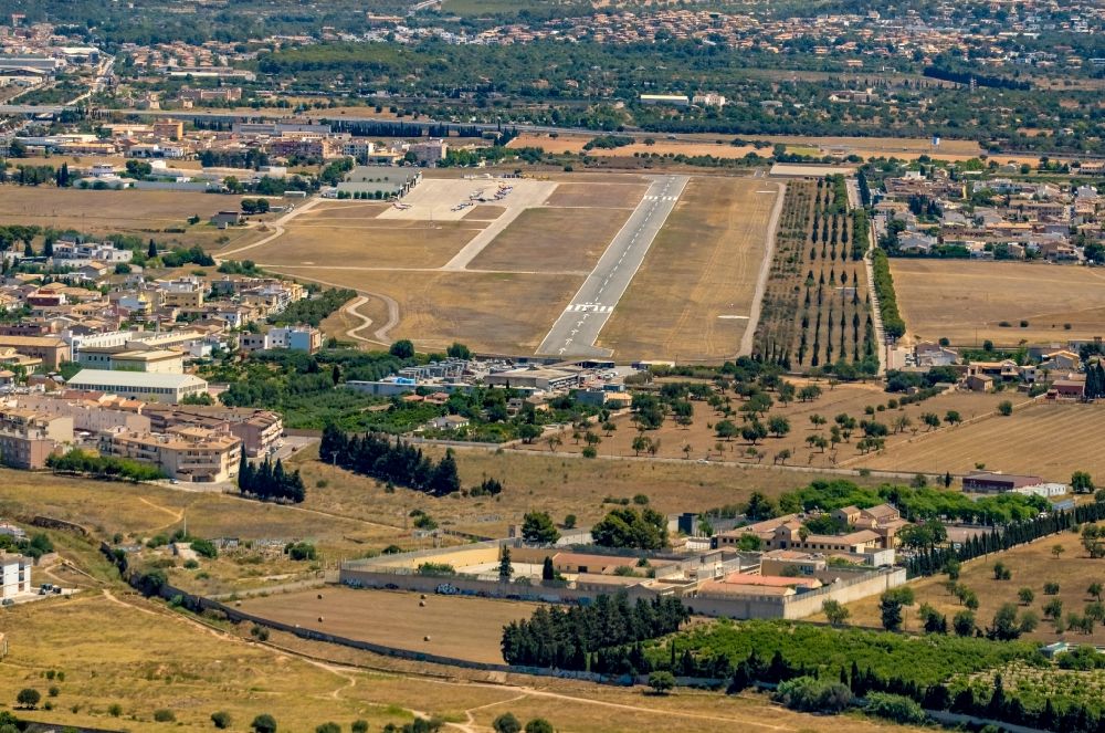 Marratxi from above - Runway with hangar taxiways and terminals on the grounds of the airport in Marratxi in Balearic island of Mallorca, Spain