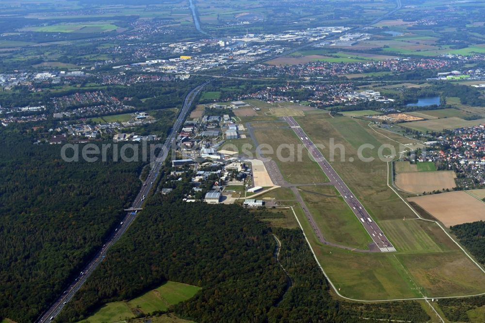 Braunschweig from the bird's eye view: Runway with hangar taxiways and terminals on the grounds of the airport in the district Waggum in Brunswick in the state Lower Saxony, Germany