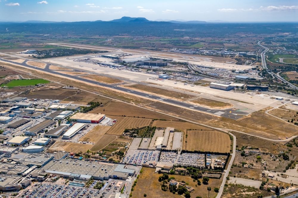 Palma from the bird's eye view: Runway with hangar taxiways and terminals on the grounds of the airport Sant Joan in the district Llevant de Palma District in Palma in Balearic island of Mallorca, Spain