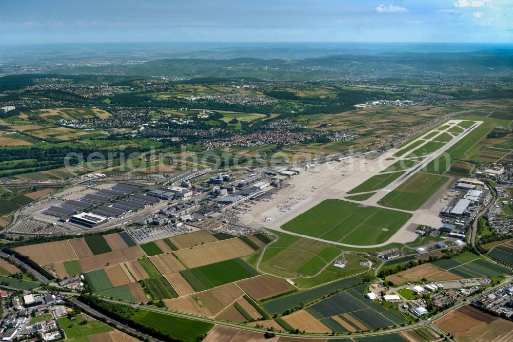 Stuttgart from the bird's eye view: Runway with hangar taxiways and terminals on the grounds of the airport in Stuttgart in the state Baden-Wuerttemberg, Germany