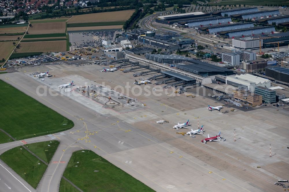 Filderstadt from the bird's eye view: Runway with hangar taxiways and terminals on the grounds of the airport in Stuttgart in the state Baden-Wuerttemberg, Germany