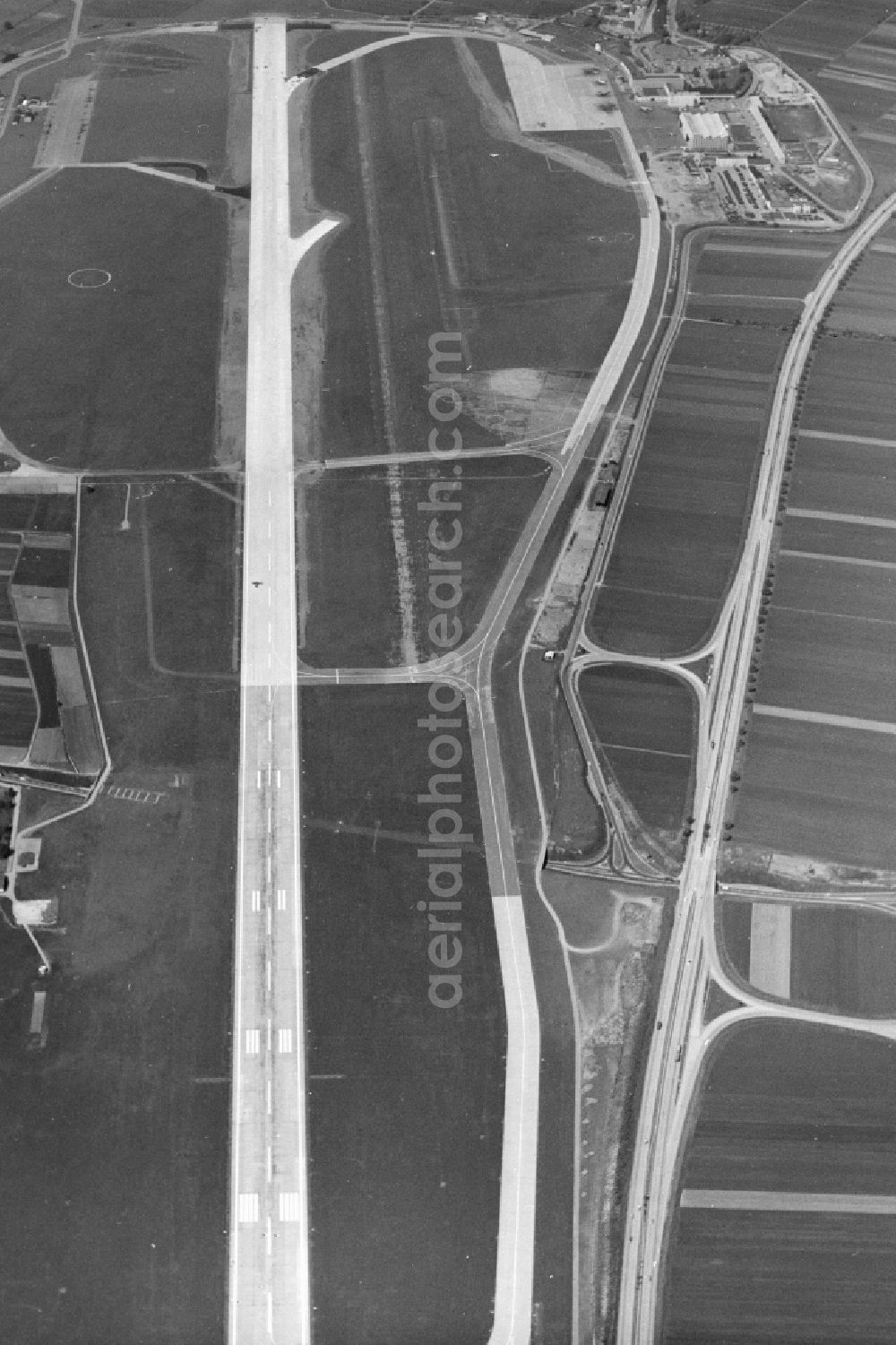 Filderstadt from the bird's eye view: Runway with hangar taxiways and terminals on the grounds of the airport in Stuttgart in the state Baden-Wuerttemberg, Germany