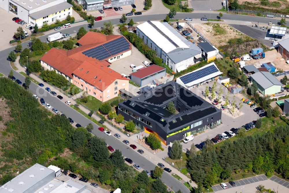 Aerial image Roth - Ground, administration and basis of the charitable organization Auf Draht gemeinnuetzige GmbH overlooking the building of the Schlosserei-Metallbau Enzingmueller in the Drahtzieherstrasse in Roth in the state Bavaria, Germany