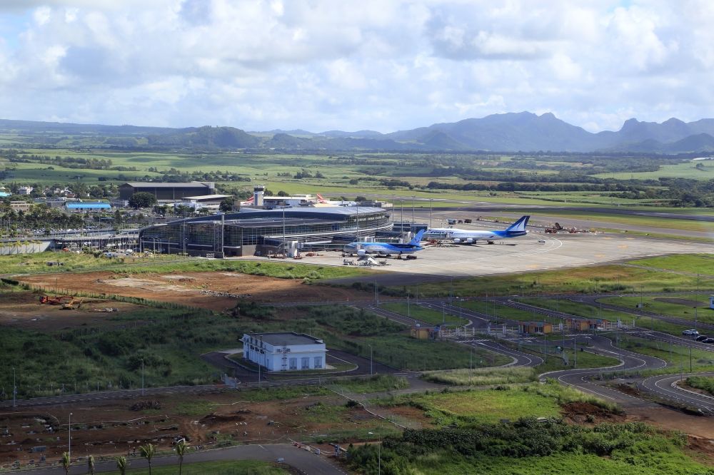 Plaine Magnien from above - Terminals and airliners on the grounds of the International Airport Sir Seewoosagur Ramgoolam in Plaine Magnien, Mauritius