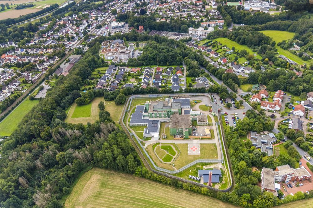 Fröndenberg/Ruhr from the bird's eye view: Prison premises and secure fencing of the JVA - correctional hospital - prison hospital in Froendenberg/Ruhr in the state North Rhine-Westphalia, Germany