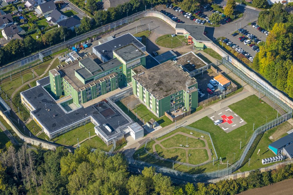 Fröndenberg/Ruhr from above - Prison premises and secure fencing of the JVA - correctional hospital - prison hospital in Froendenberg/Ruhr in the state North Rhine-Westphalia, Germany