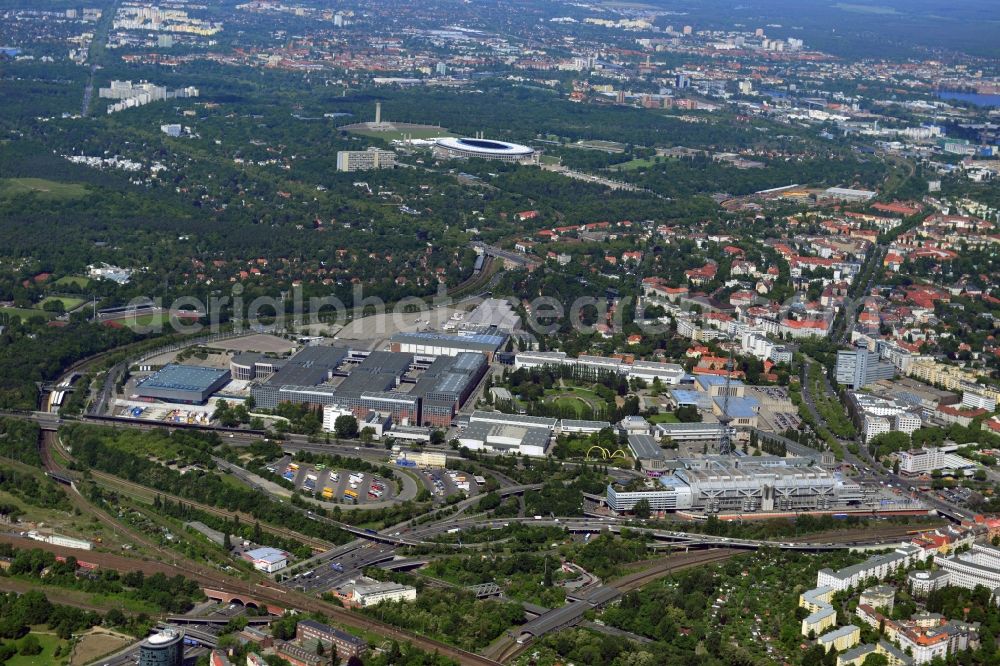 Berlin from above - At the historic radio tower of Berlin in the borough of Charlottenburg-Wilmersdorf is the Messe Berlin exhibition grounds with the exhibition halls, the newly constructed CityCube Berlin and the former congress and event center ICC. In the background the Olympic Stadium with the bell tower can be seen on the May Field