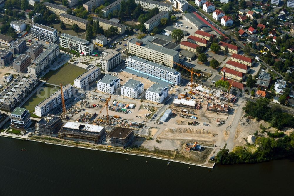 Aerial photograph Berlin - View of the area of the new construction project NeueWasserliebe - 52 Grad Nord Wohnen am Wasser in Berlin-Gruenau in the district of Gruenau in Berlin