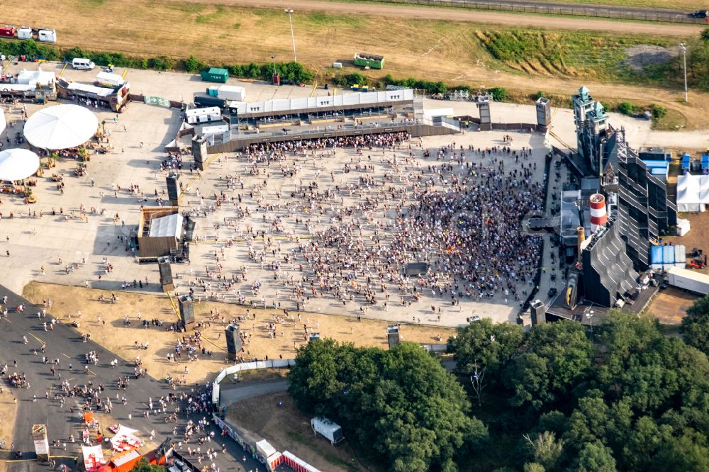 Aerial image Weeze - Participants in the PAROOKAVILLE - Electronic Music Festival music festival on the event concert area in Weeze in the state North Rhine-Westphalia, Germany