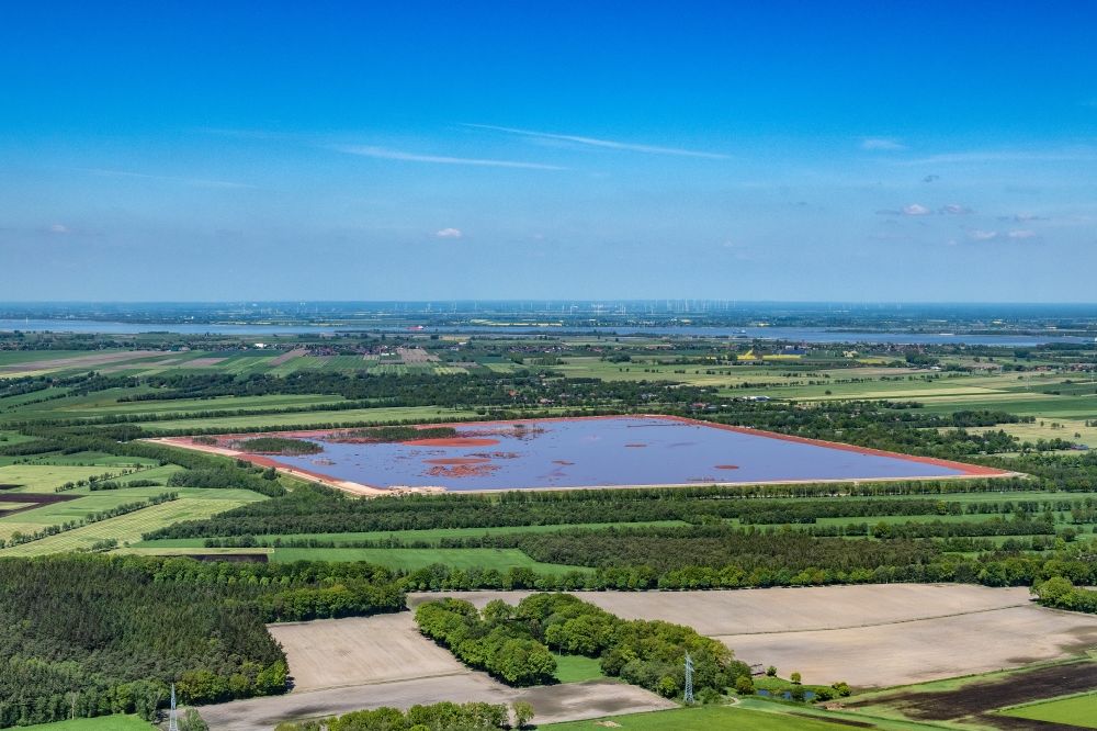 Stade from the bird's eye view: Site of the red mud disposal site in Stade in the state Lower Saxony, Germany. The red mud is a waste product resulting from the extraction of alumina
