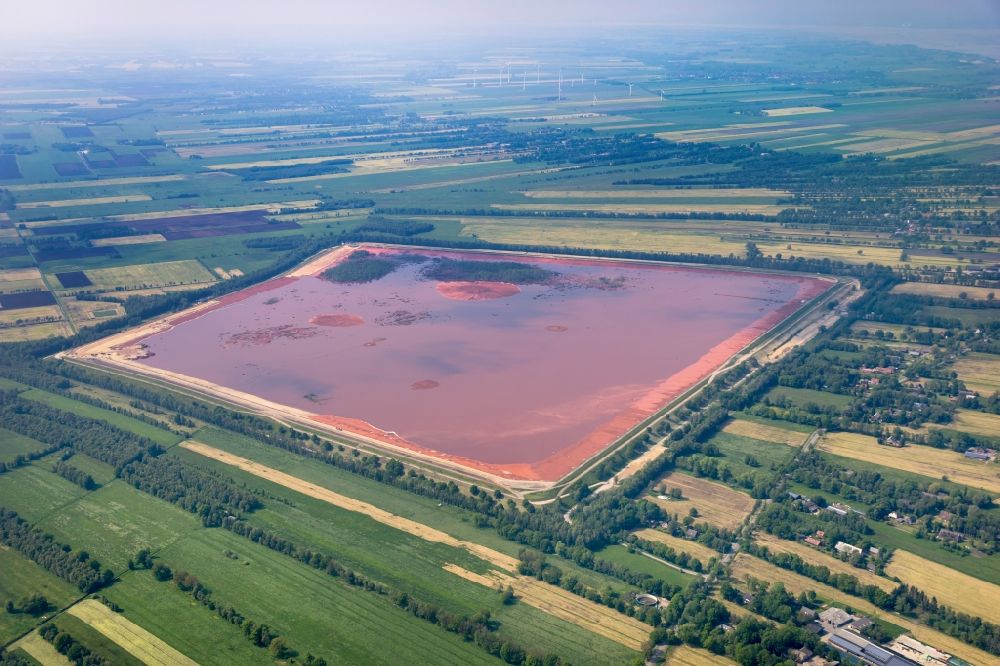 Stade from the bird's eye view: Site of the red mud disposal site in Stade in the state Lower Saxony, Germany. The red mud is a waste product resulting from the extraction of alumina