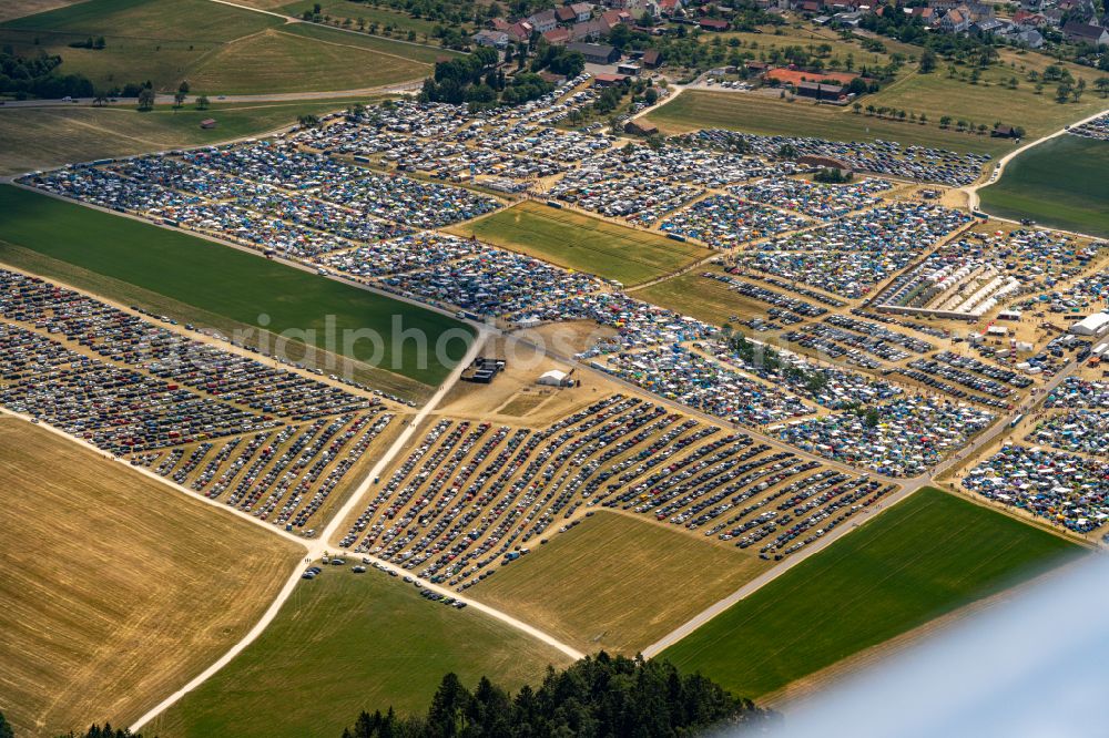 Neuhausen ob Eck from above - Participants in the Southside Music Festival with camping - tents and caravans on the event concert site of the airfield on street Take-Off Gewerbepark in Neuhausen ob Eck in the state Baden-Wuerttemberg, Germany