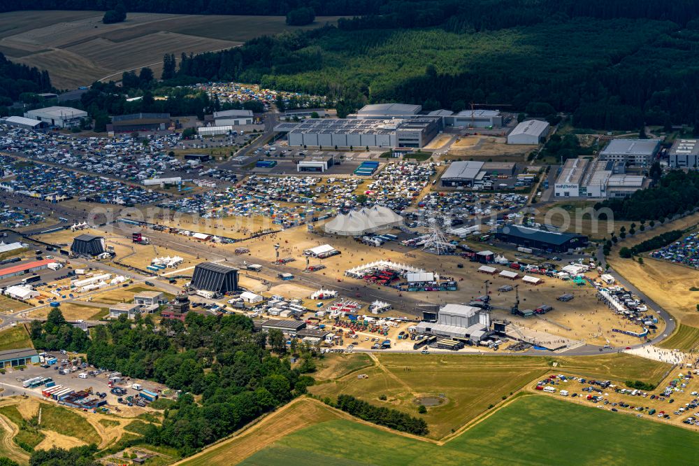 Aerial image Neuhausen ob Eck - Participants in the Southside Music Festival with camping - tents and caravans on the event concert site of the airfield on street Take-Off Gewerbepark in Neuhausen ob Eck in the state Baden-Wuerttemberg, Germany