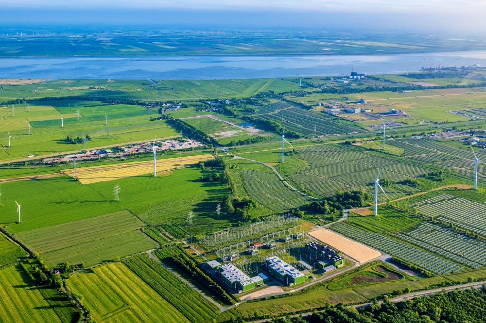 Büttel from above - Site of the substation for voltage conversion and electrical power supply Brunsbuettel in Buettel in the state Schleswig-Holstein, Germany
