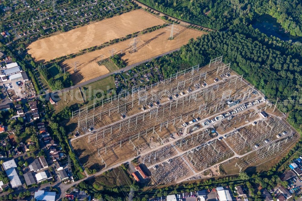 Karlsruhe from above - Site of the substation for voltage conversion and electrical power supply of EnBW Energie Baden-Wuerttemberg AG, Rheinhafen-Dampfkraftwerk Karlsruhe in the district Daxlanden in Karlsruhe in the state Baden-Wuerttemberg, Germany
