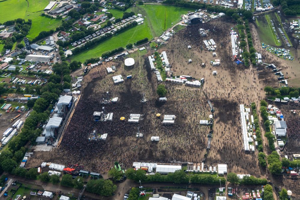 Wacken from the bird's eye view: Participants in the Wacken music festival on the event concert area in Wacken in the state Schleswig-Holstein, Germany
