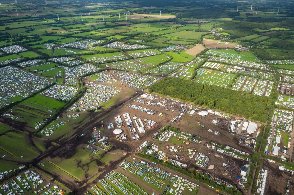 Aerial image Wacken - Participants in the Wacken music festival on the event concert area in Wacken in the state Schleswig-Holstein, Germany