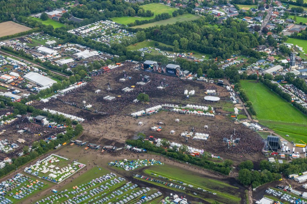 Aerial image Wacken - Participants in the Wacken music festival on the event concert area in Wacken in the state Schleswig-Holstein, Germany