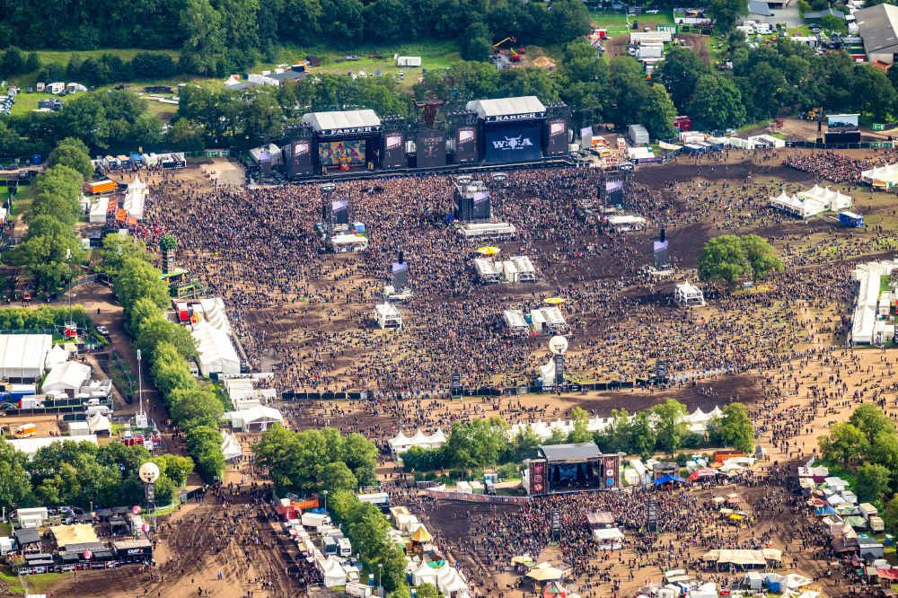 Wacken from the bird's eye view: Participants in the Wacken music festival on the event concert area in Wacken in the state Schleswig-Holstein, Germany