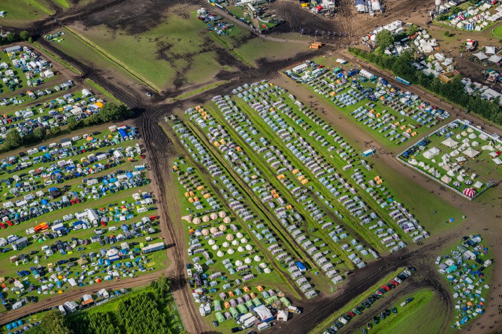 Wacken from above - Participants in the Wacken music festival on the event concert area in Wacken in the state Schleswig-Holstein, Germany