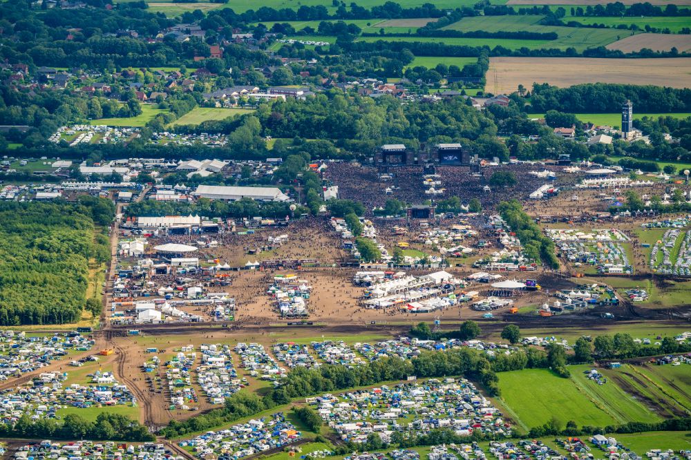 Aerial photograph Wacken - Participants in the Wacken music festival on the event concert area in Wacken in the state Schleswig-Holstein, Germany