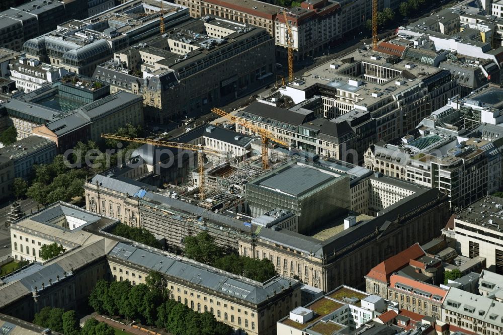 Aerial photograph Berlin - Overhaul and modernization of the State Library of Berlin Unter den Linden in the district Mitte in Berlin. Currently in the first phase arises a new reading roomas a glass cube, a rare book reading room, a safe magazine for the special collections also incurred is the north old building which will be completely renovated. In the second phase then will arise a Freehand magazin, a treasury, a library museum, an exhibition area, a catering facility and the northern part of the old building will be completely renovated. The activities are carried out by the architect and museum designer HG Merz, builder is the covenant