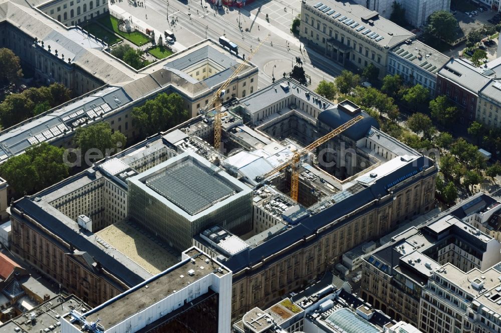 Aerial image Berlin - Overhaul and modernization of the State Library of Berlin Unter den Linden in the district Mitte in Berlin. Currently in the first phase arises a new reading roomas a glass cube, a rare book reading room, a safe magazine for the special collections also incurred is the north old building which will be completely renovated. In the second phase then will arise a Freehand magazin, a treasury, a library museum, an exhibition area, a catering facility and the northern part of the old building will be completely renovated. The activities are carried out by the architect and museum designer HG Merz, builder is the covenant