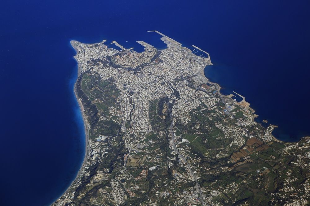 Aerial photograph Rodos - City area with outside districts and coastline in Rhodes on the Island Rhodes, Greece. The old town of Rodos in the Mediterranean Sea and South Aegean is designated as World Heritage City by UNESCO