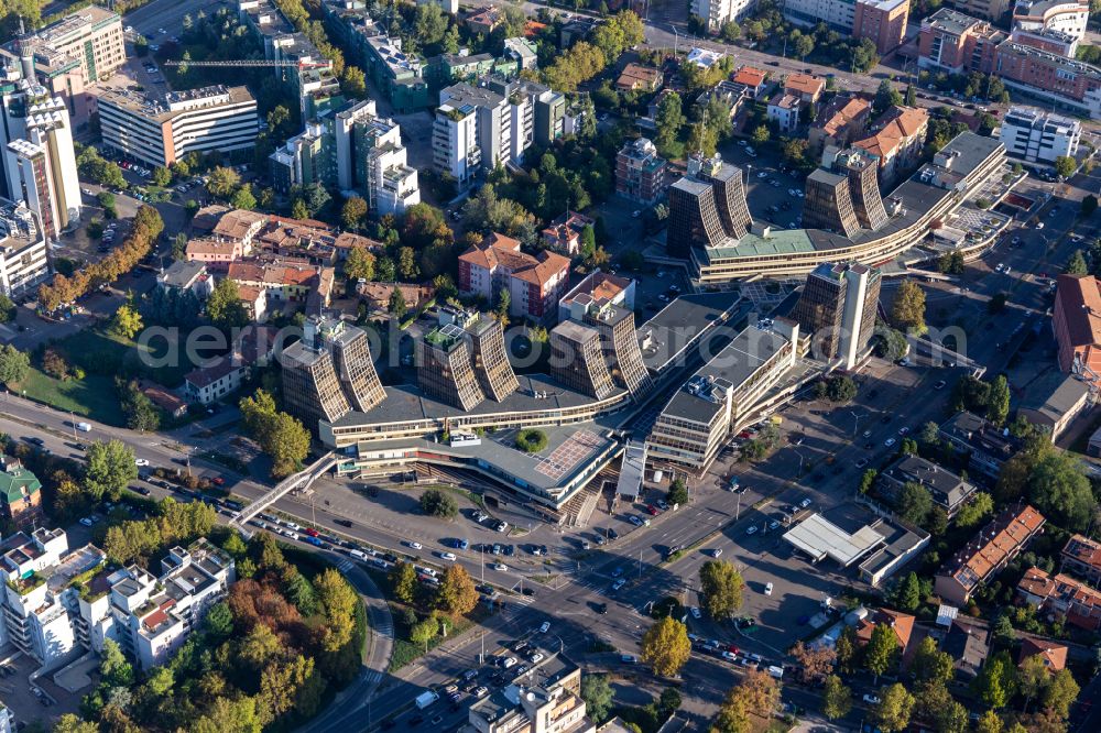Aerial photograph Modena - Wave-formed Buildings of the shopping malls on street Via Pietro Giardini in Modena in Emilia-Romagna, Italy