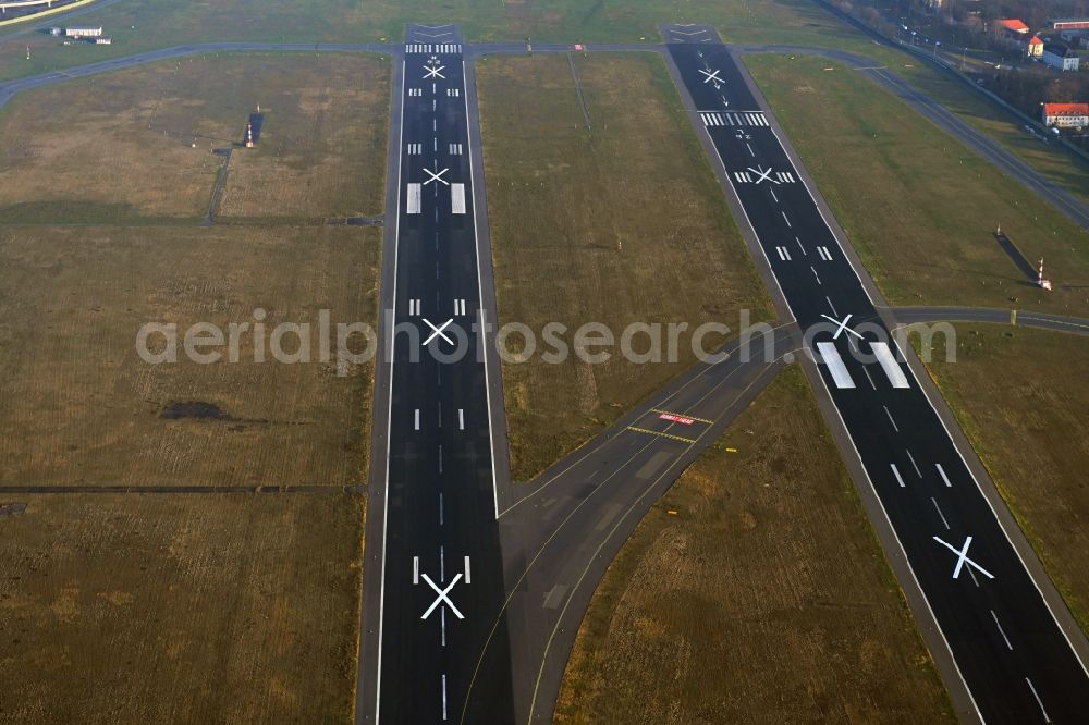 Berlin from the bird's eye view: Locked runway on the site of the former airport in the district Tegel in Berlin, Germany