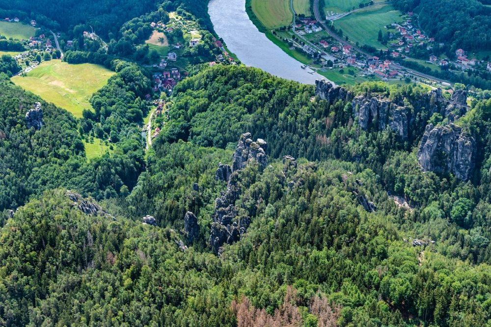 Rathen from the bird's eye view: Rock massif and rock formation Ferdinandstein on Basteiweg in Lohmen at the elbe river in the state Saxony, Germany