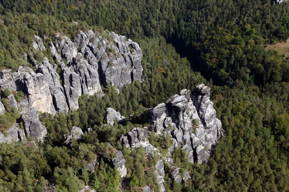 Aerial photograph Lohmen - Rock massif and rock formation Ferdinandstein on Basteiweg in Lohmen in the state Saxony, Germany