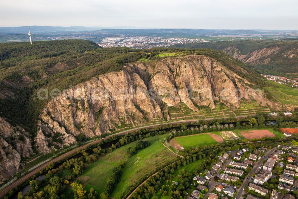 Ebernburg from above - Rock massif and rock formation Der Rotenfels on street L235 in Ebernburg in the state Rhineland-Palatinate, Germany