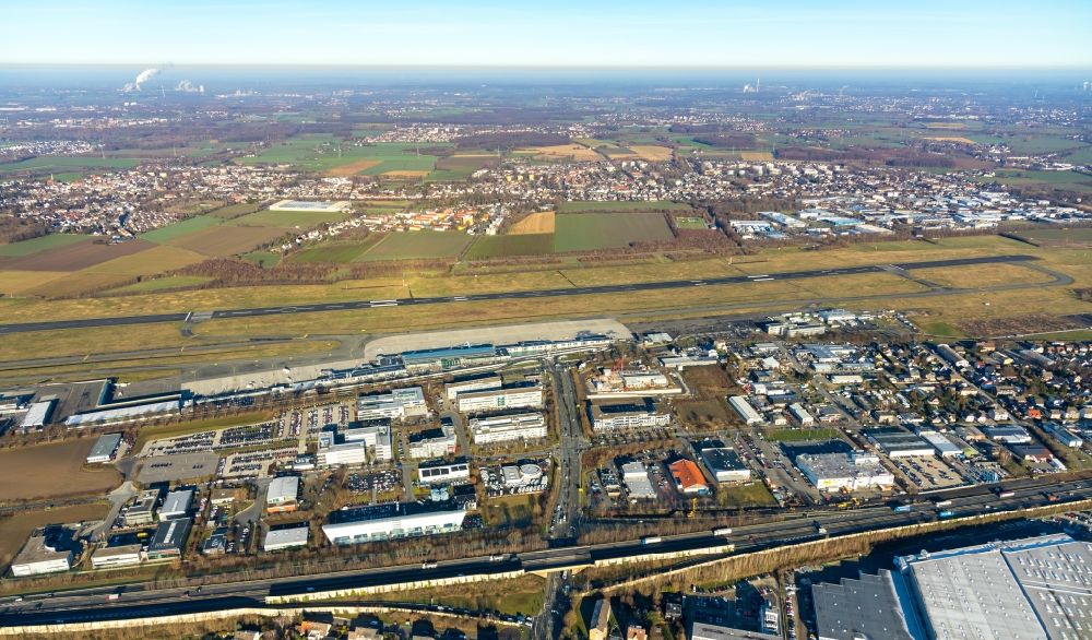 Holzwickede from above - Industrial estate and company settlement overlooking the airport in the district Brackel in Holzwickede in the state North Rhine-Westphalia, Germany