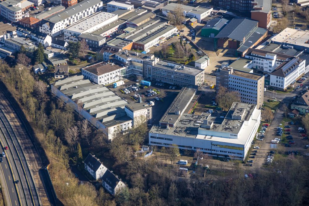 Aerial photograph Essen - Industrial estate and company settlement along the Bundesautobahn A52 - Schuermannstrasse in Essen in the state North Rhine-Westphalia, Germany