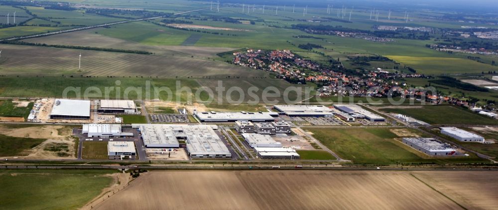 Thalheim from the bird's eye view: Industrial estate and company settlement along the Sonnenallee in Thalheim in the state Saxony-Anhalt, Germany