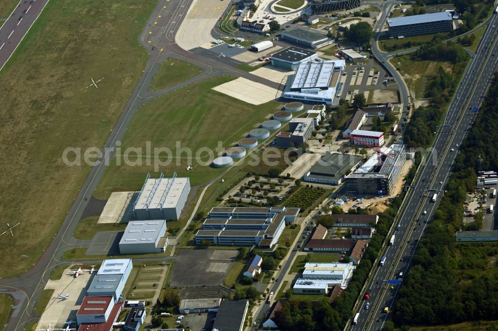 Braunschweig from the bird's eye view: Industrial estate and company settlement on airport in the district Waggum in Brunswick in the state Lower Saxony, Germany