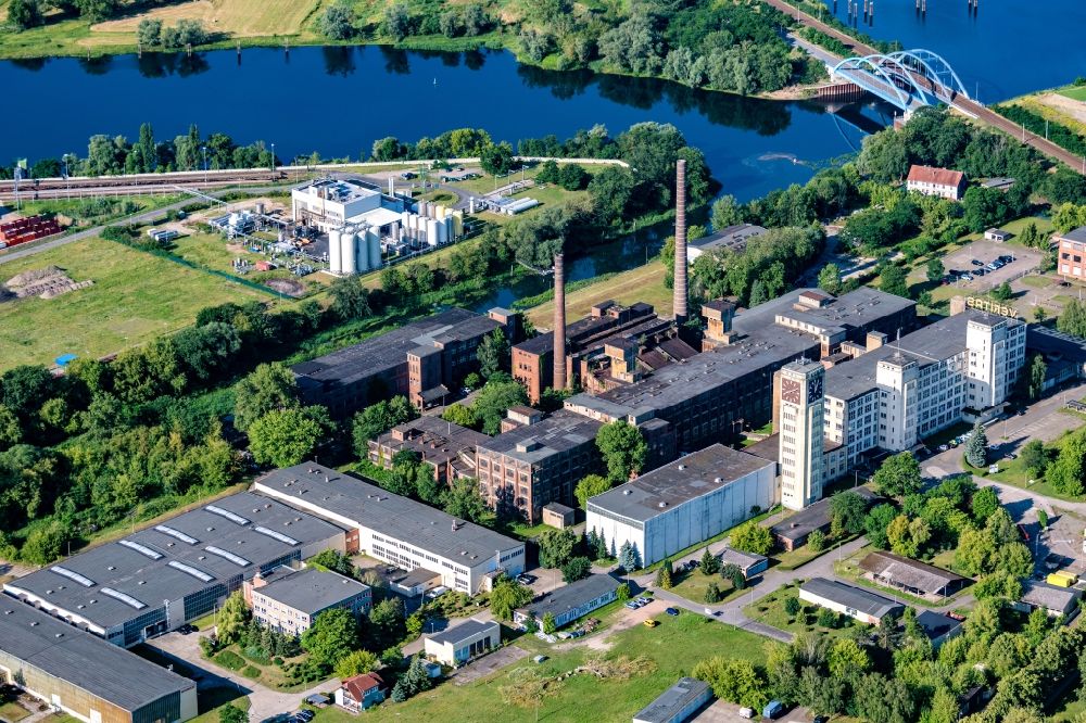 Aerial photograph Wittenberge - Gasedow industrial park, clock tower and sewing machine factory in Wittenberge in the state Brandenburg, Germany