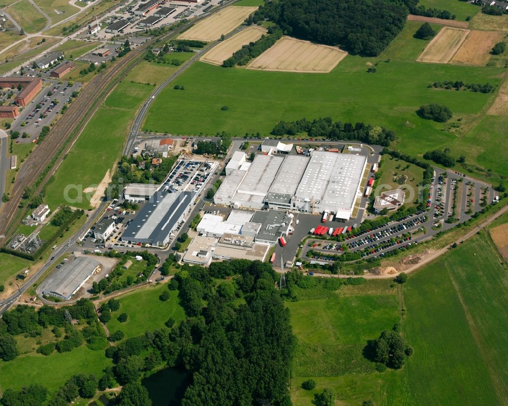 Aerial image Gießen - Industrial estate and company settlement on Industriestrasse in the district Roedgen in Giessen in the state Hesse, Germany