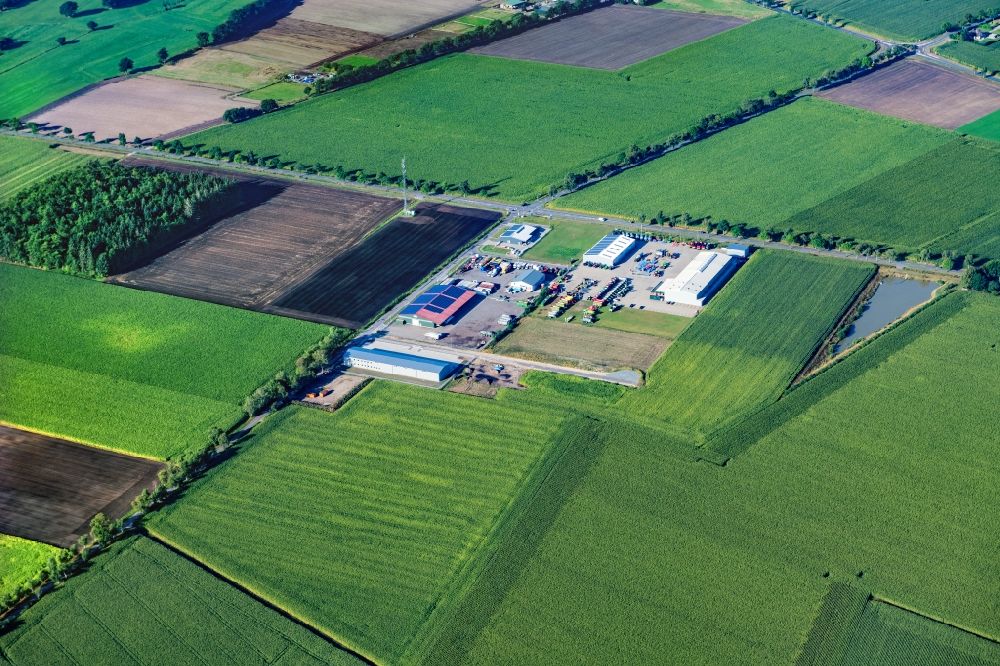 Ahlerstedt from the bird's eye view: Industrial estate and company settlement Landmaschinen Schroeder in Ahlerstedt in the state Lower Saxony, Germany