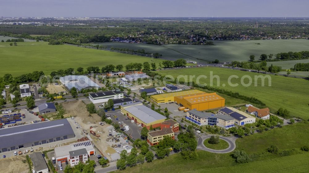 Schöneiche from the bird's eye view: Industrial estate and company settlement North in Schoeneiche in the state Brandenburg, Germany