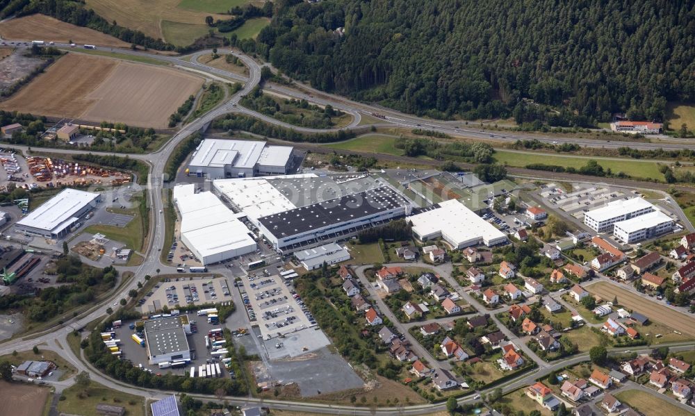 Kronach from the bird's eye view: Commercial area and company settlement with the Dr. Schneider group of companies in the district Neuses in Kronach in the state Bavaria, Germany