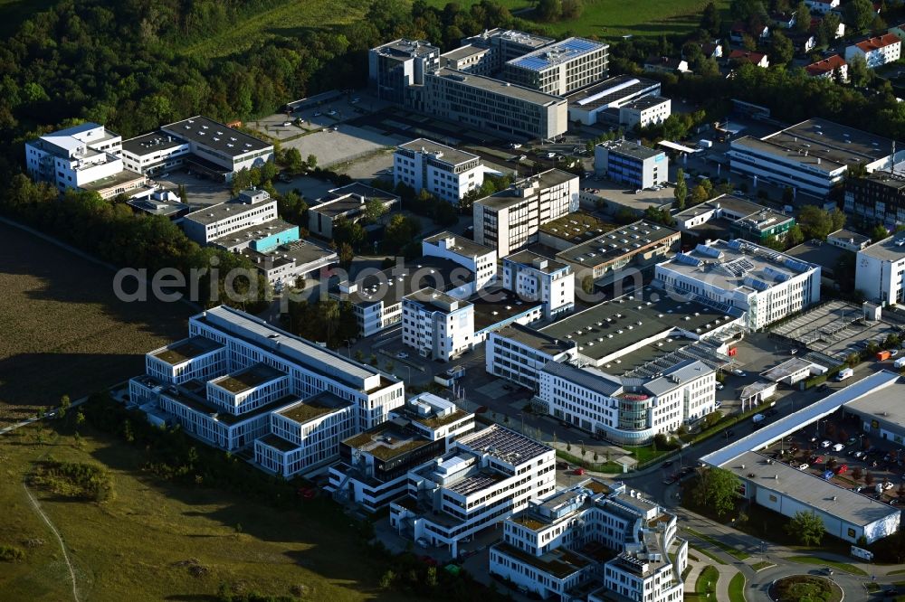 Planegg from the bird's eye view: Industrial estate and company settlement Pasinger Strasse - Behringstrasse - Robert-Koch-Strasse in Planegg in the state Bavaria, Germany