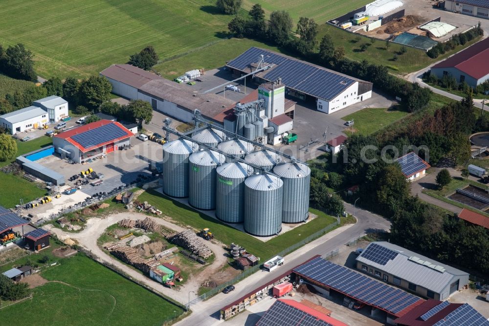 Aerial image Holzheim - Industrial estate and company settlement on Raiffeisenstrasse in Holzheim in the state Bavaria, Germany