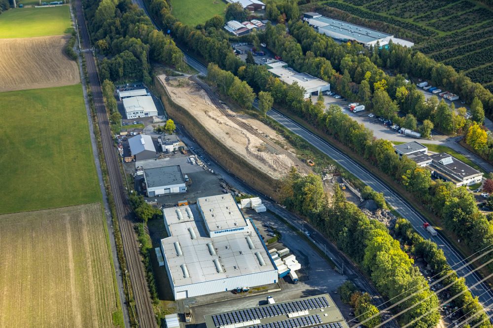 Aerial image Bestwig - Industrial estate and company settlement with a sandy area along the L743 on street Im Oehler in the district Velmede in Bestwig at Sauerland in the state North Rhine-Westphalia, Germany