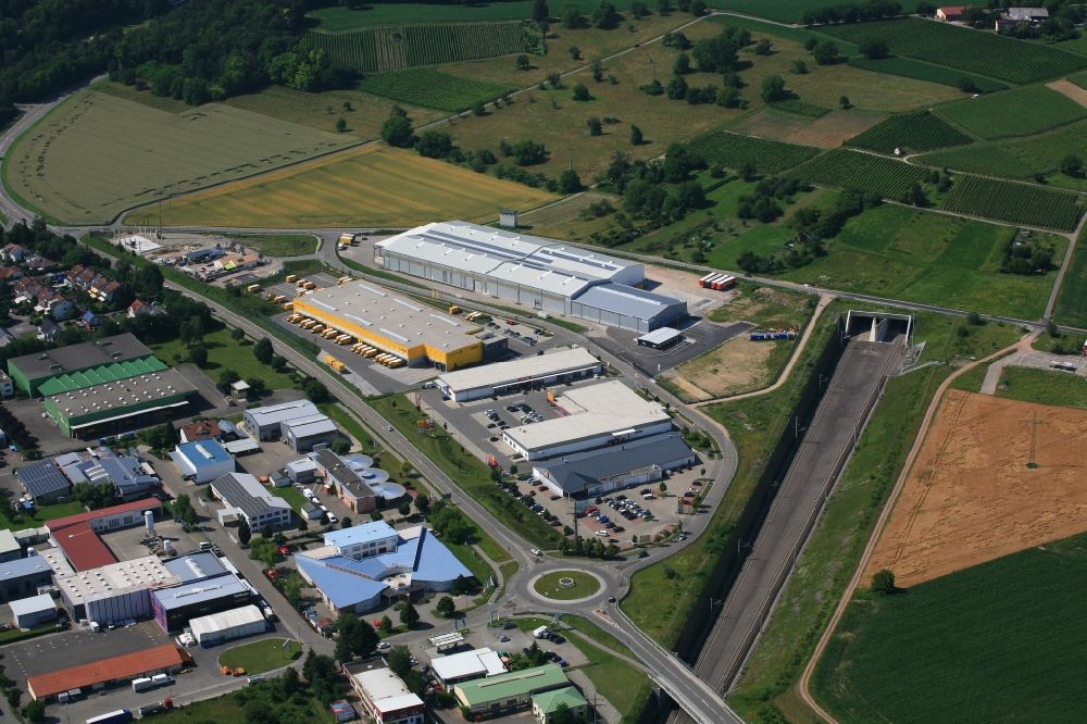 Aerial image Efringen-Kirchen - Industrial estate and company settlement Schloettle at the south Portal uf the railway tunnel Katzenbergtunnel in Efringen-Kirchen in the state Baden-Wurttemberg, Germany