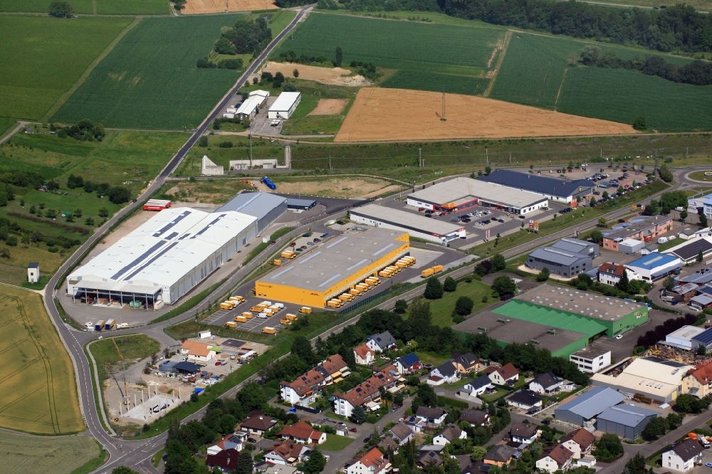 Aerial image Efringen-Kirchen - Industrial estate and company settlement Schloettle at the south Portal uf the railway tunnel Katzenbergtunnel in Efringen-Kirchen in the state Baden-Wurttemberg, Germany