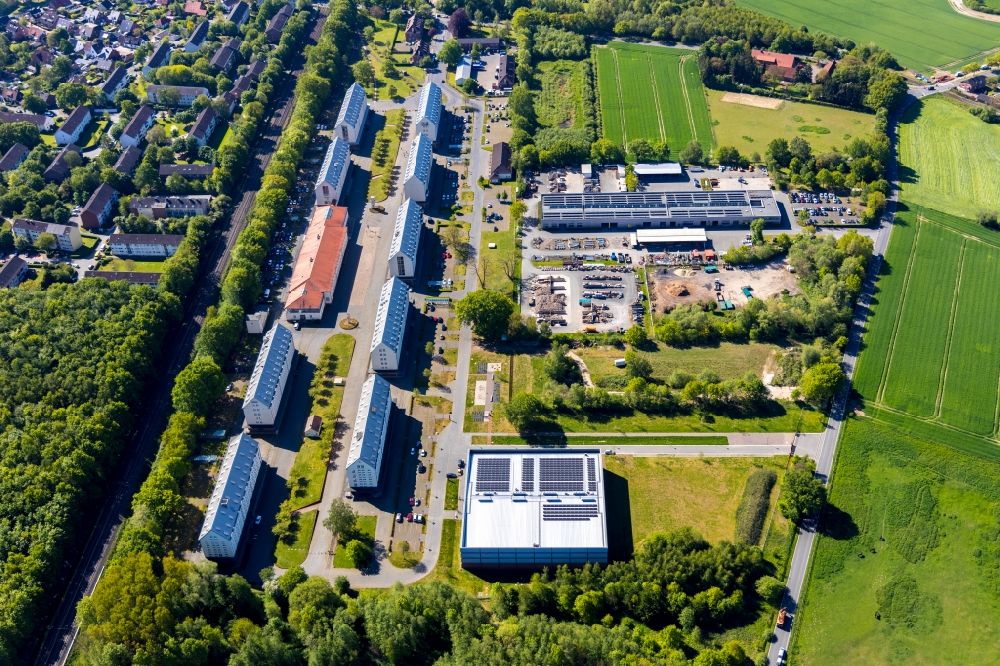 Münster from the bird's eye view: Industrial estate of the Speicherstadt Muenster with education center and administrative buildings An den Speichern in Muenster in the state North Rhine-Westphalia, Germany